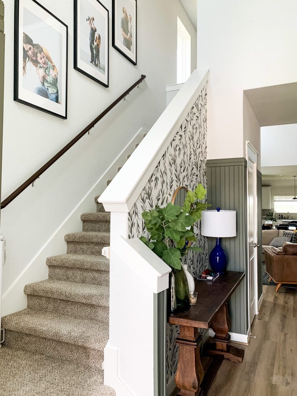 How to Hang Photos on Your Staircase Love & Renovations