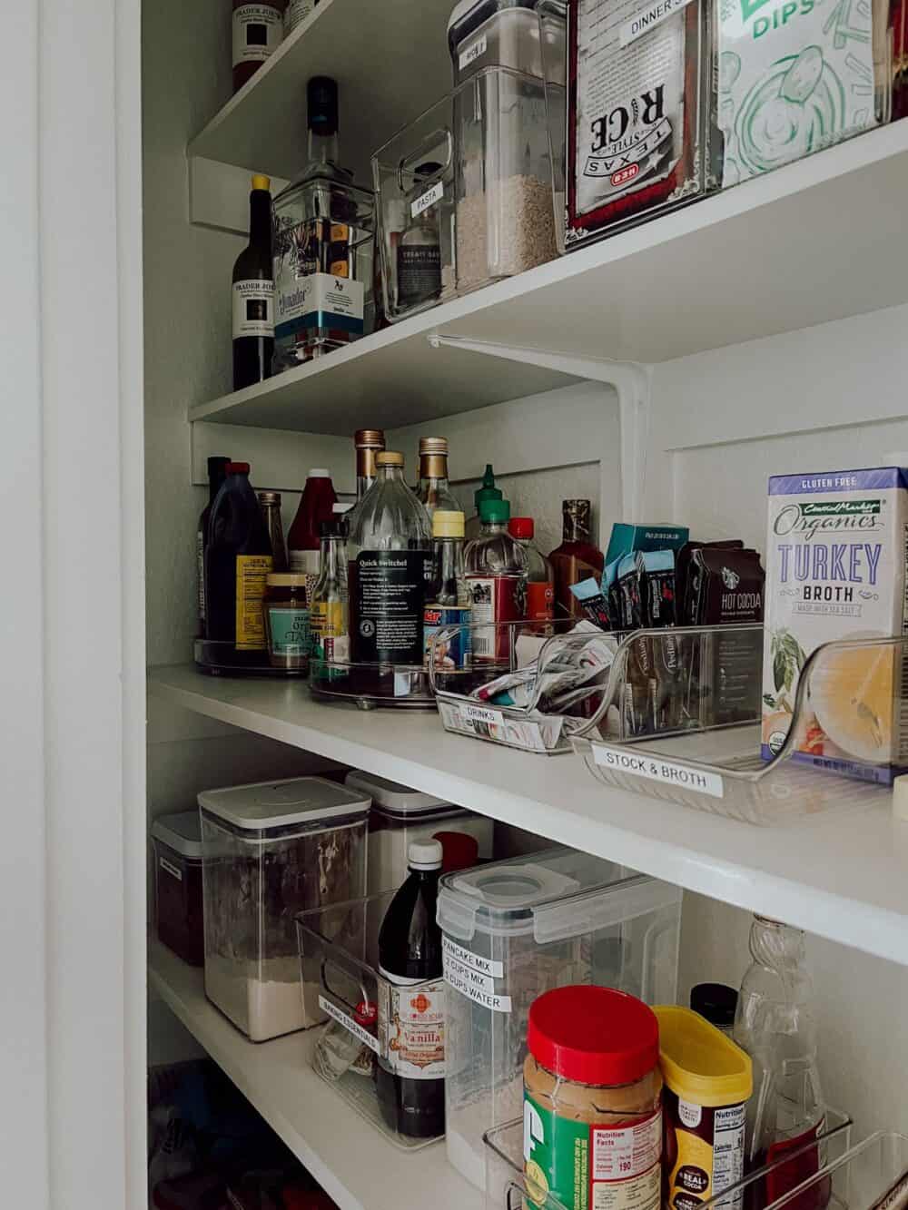 Kitchen storage idea for cups and drink bottles cupboard
