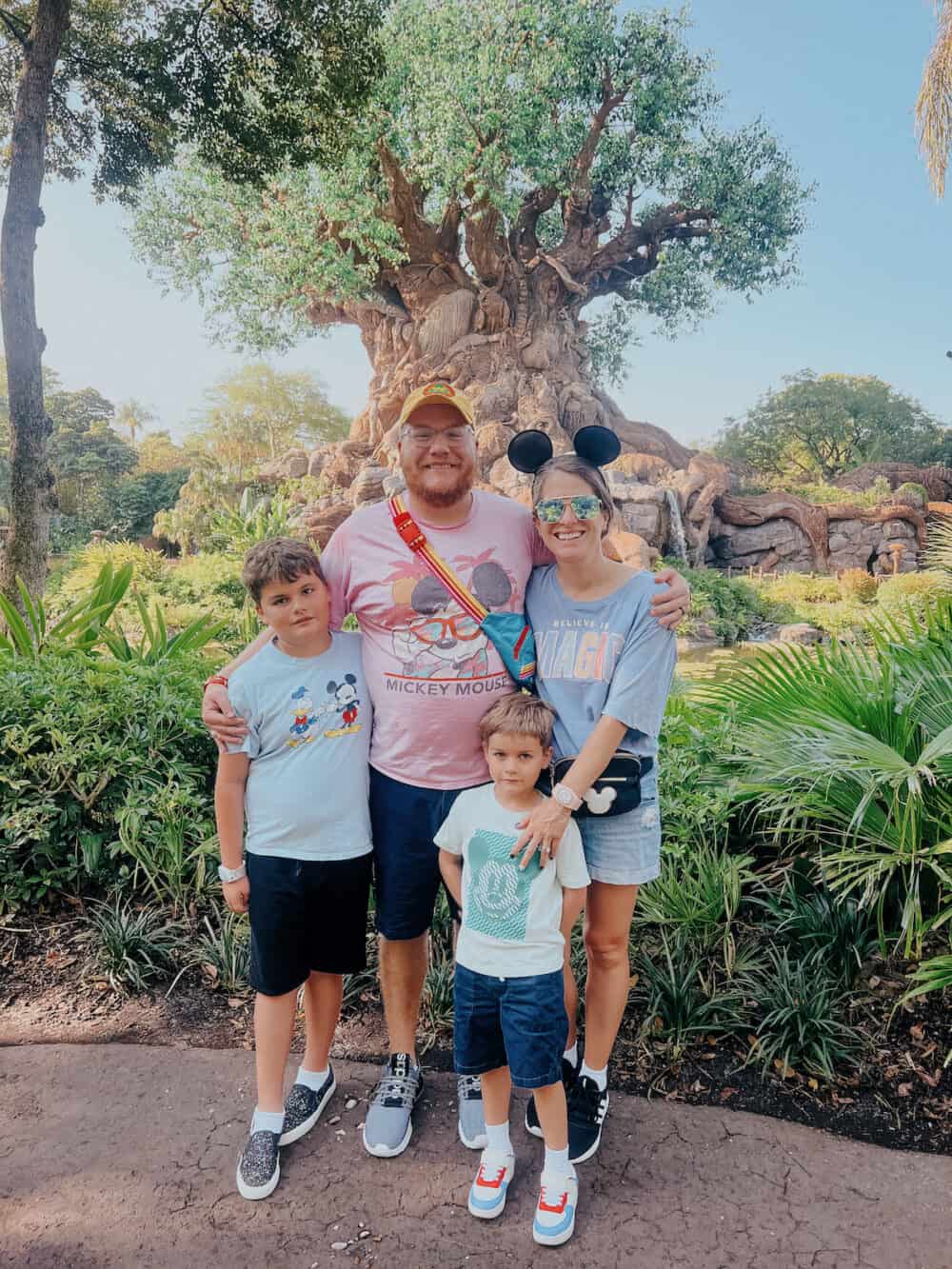 Family posing in front of the Tree of Life in Animal Kingdom