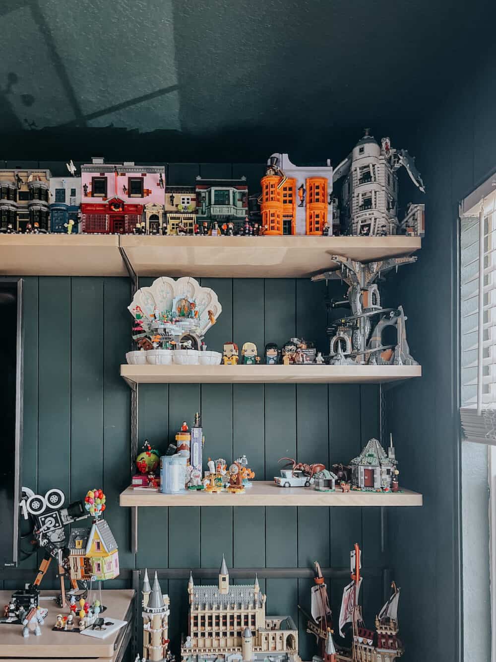 Family room with shelving full of lego