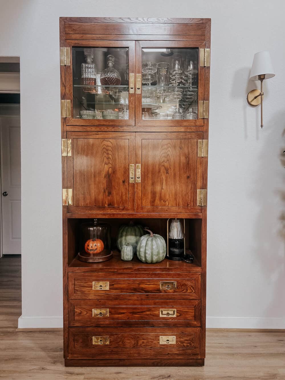 bar cabinet decorated for fall 