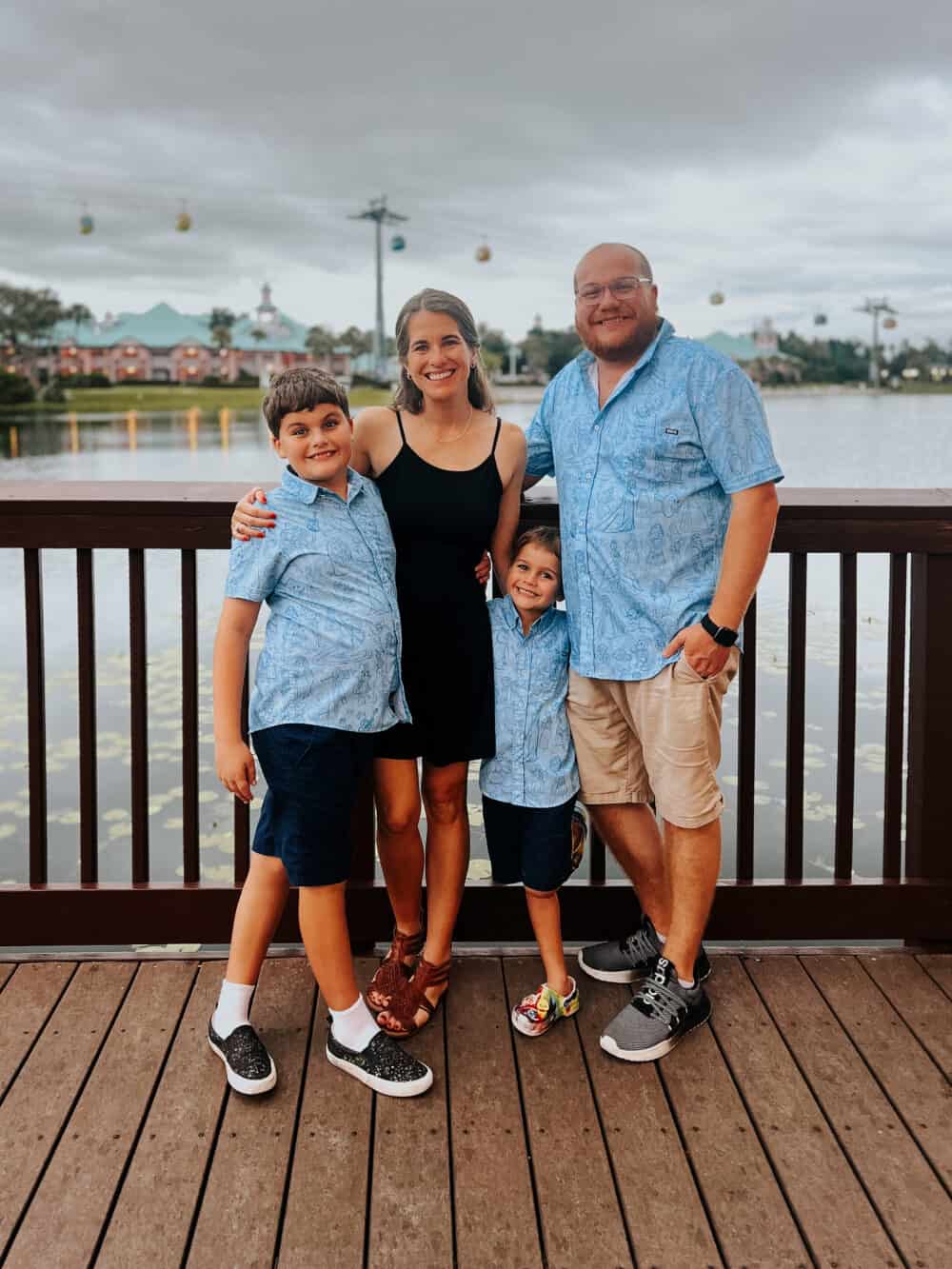 family posing for a photo at Caribbean Beach Resort in Walt Disney world 