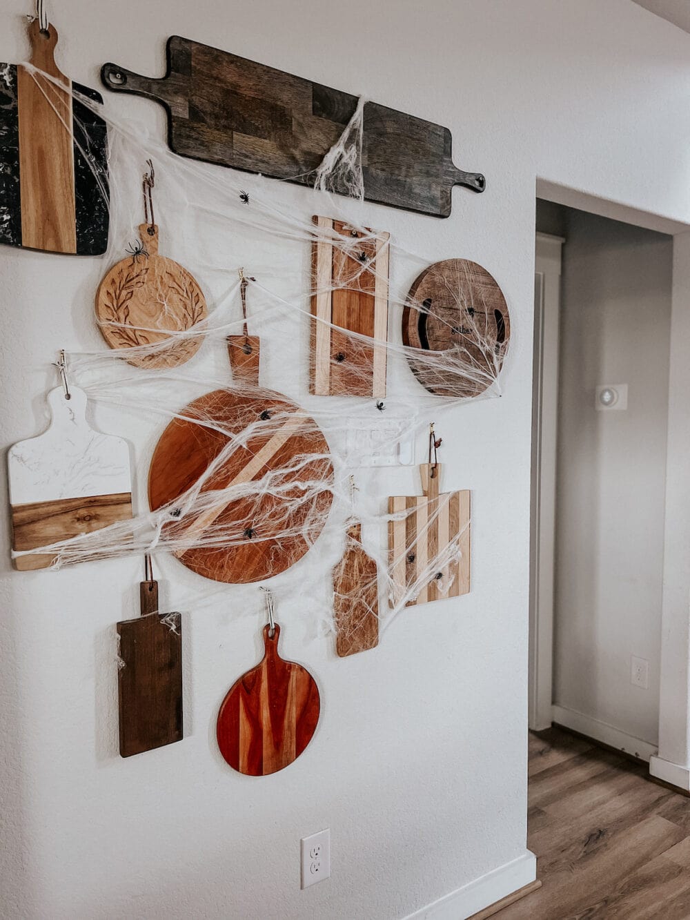 cutting board wall with cobwebs