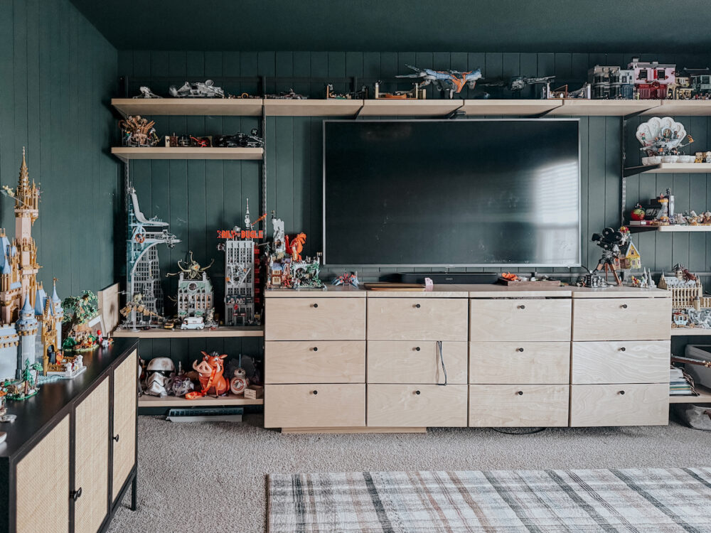 family room with lego shelving